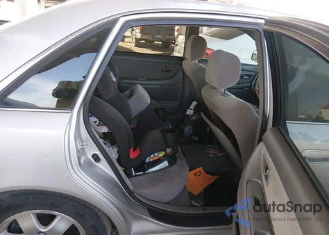 2001 Toyota Avalon Xl z USA, uszkodzony, nr VIN 4T1BF28B81U149903